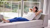 Woman resting on a chaise