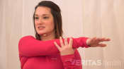 Woman doing a Crossover Shoulder Stretch