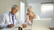 Older woman talking with a doctor