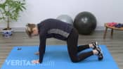 Woman doing a cat cow pose