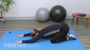 Woman doing a child&#039;s pose