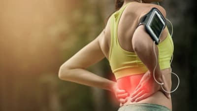 Woman with lumbar pain