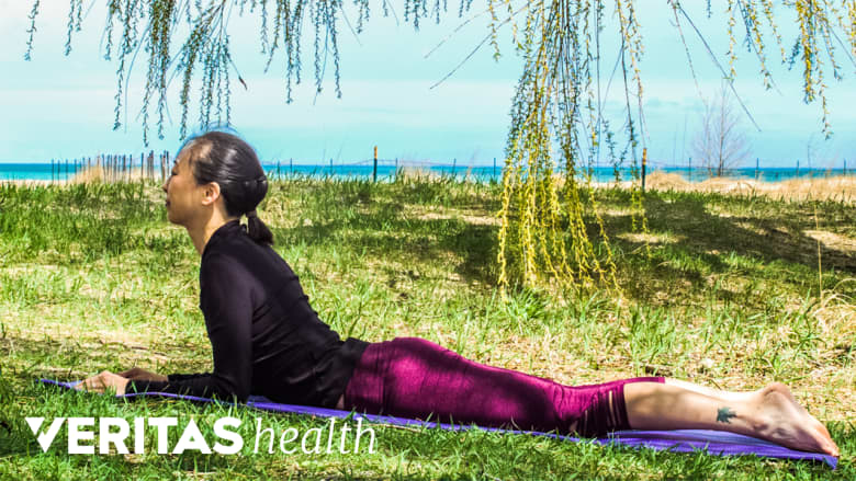 Woman doing press up exercise for sciatica pain relief