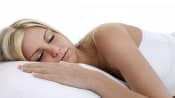 Woman asleep on her stomach