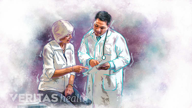 Doctor consulting a senior female patient