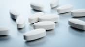Acetaminophen scattered on a tabletop