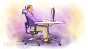 Man sitting correctly in his office chair.