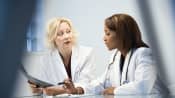 Doctors reviewing and x-ray