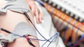 PENS and Electrical Muscle Stimulation on patient&#039;s leg