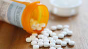 Scattered prescription pills.