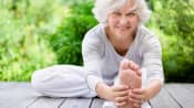 Senior woman doing a hamstring stretch for sciatic pain