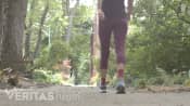 Woman walking on the sidewalk