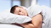 Man sleeping on his stomach